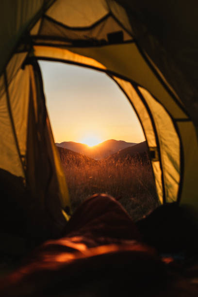 Sun rise in Carpathian mountains view from a tent