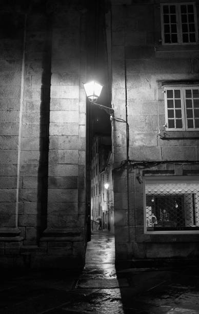 istock Reflections in a lonely street 1297931481