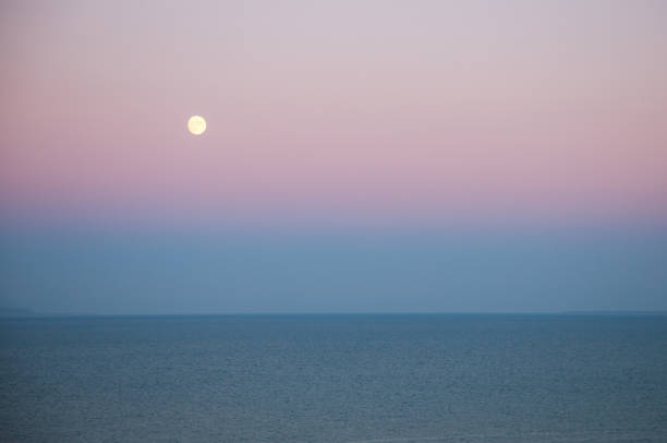 istock a moon over the sea 1297933194