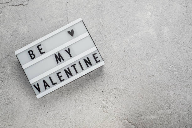 istock Be my Valentine light box on gray cement background 1297936982