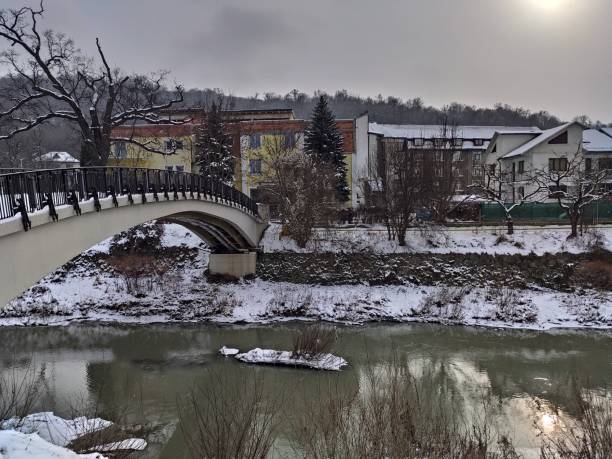 istock Romania, Bistrita River and the bridge at Codrisor in January 2021 1297937911