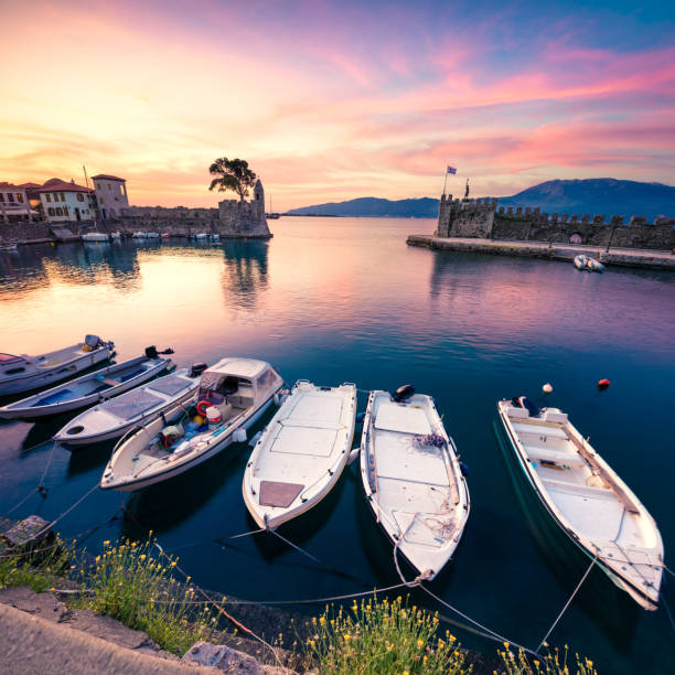 impressive spring view of the nafpaktos port. fantastic sunrise in the gulf of corinth, greece, europe. beauty of countryside concept background. beauty of countryside concept background. - gulf of corinth imagens e fotografias de stock