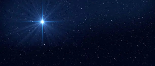 Dark blue night sky with bright star. Baner format. Christmas Star of Bethlehem Nativity, christmas of Jesus Christ.