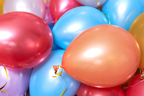 istock many colored balloons forming a bright background wallpaper image 1297942373