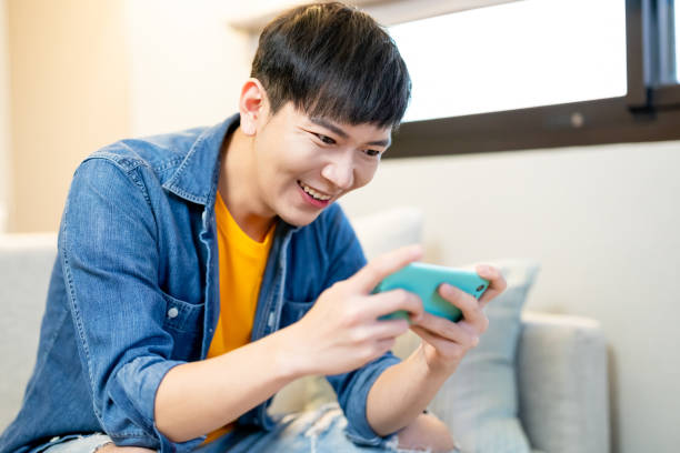istock Asian man use mobile phone 1297942522