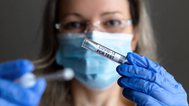 istock COVID-19 test in doctor hands close-up 1297943841