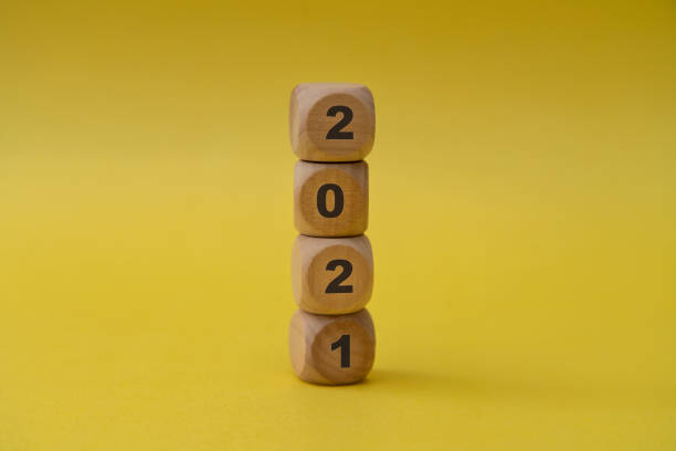 istock 2021 written on wooden blocks. 1297946059