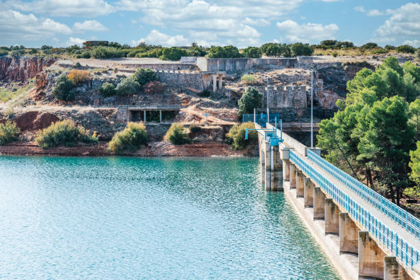 istock Dam in the reservoir with blue railings 1297947260