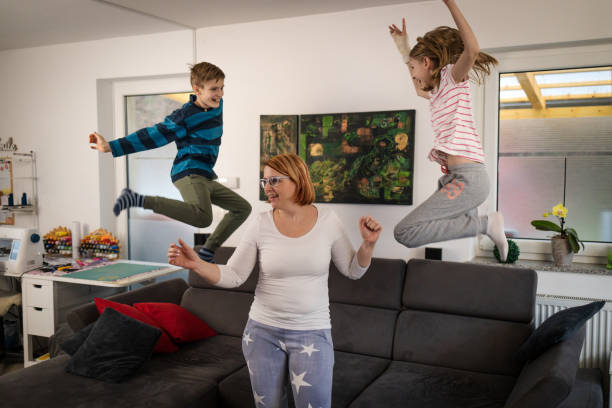 istock Mother enjoying free time with her kids 1297950393