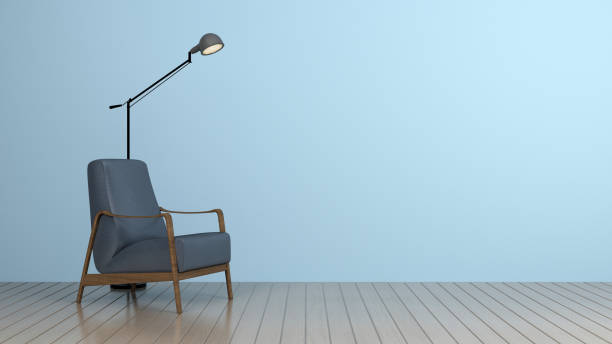 istock armchair with lamp and clear blue wall 1297951987
