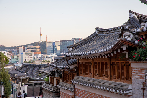 Old Seoul buildings with modern cityscape on the background