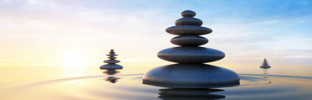 istock Stacks of Stones in the ocean 1297954560