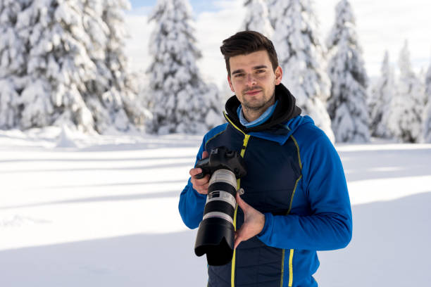istock He likes taking photos of trees covered with snow. 1297957333
