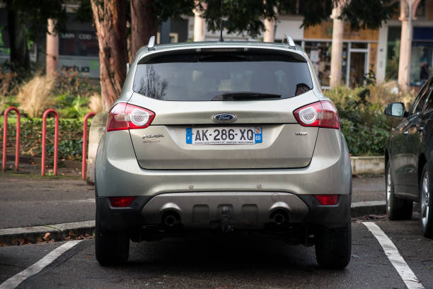 Rear view of grey Ford Kuga  SUV parked in the street stock photo