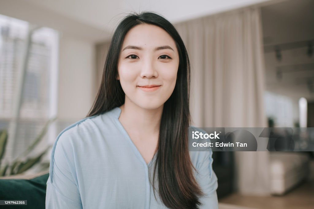 Asian Chinese Beautiful Woman Looking At Camera Videocall Smiling Indoor  Stock Photo - Download Image Now - iStock