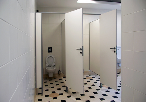 White toilets in a public toilet