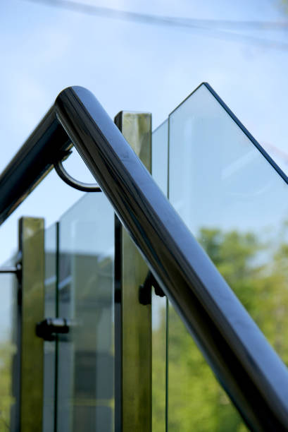 istock Glass railing at the stairs with handrails 1297966164