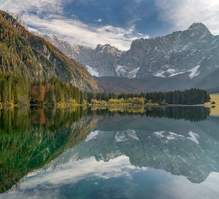 Panorama of the beautiful Lago Superiore Di Fusine with the famous Mount Mangart reflecting in the lake, Tarvisio, Italy. Converted from RAW.