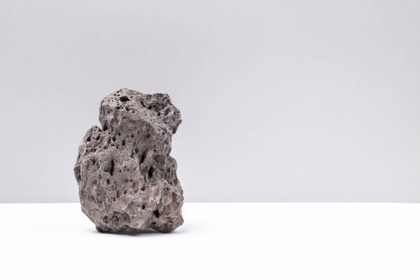 Stone on grey white background, poise stones stock photo