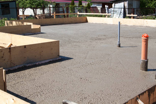 istock concrete slab of foundation with wooden formwork 1297977928