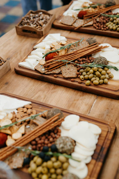 istock welcome buffet with alcohol and snacks, sandwiches, cupcakes 1297979522