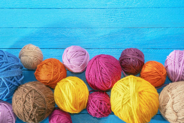 istock Colorful balls of wool. Copy space 1297983863
