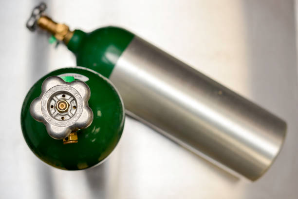 istock Two Medical Oxygen Tanks from Above with One on Side 1297985146