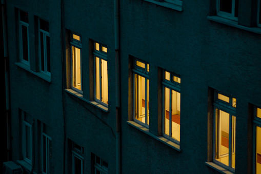 View of windows in a row at night.