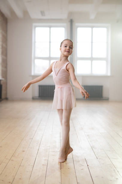 istock Girl performing ballet dance 1297995417