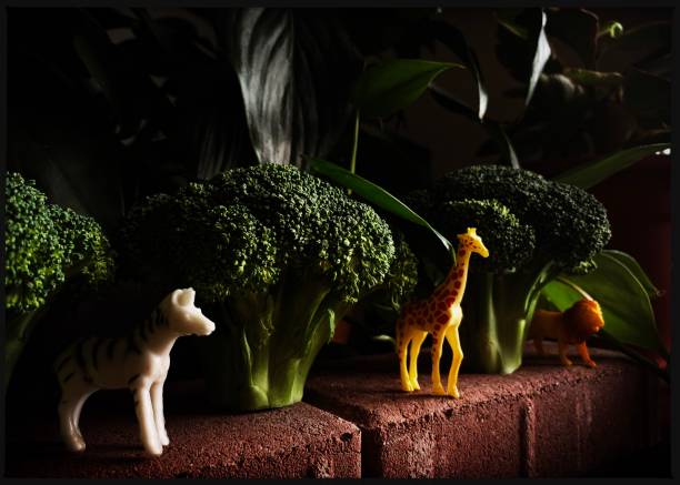 istock Small Toy Animals in Make Believe Scene 1297996636