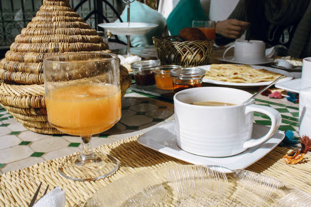 istock Cup coffe orange juice breakfast in terrace 1298003105
