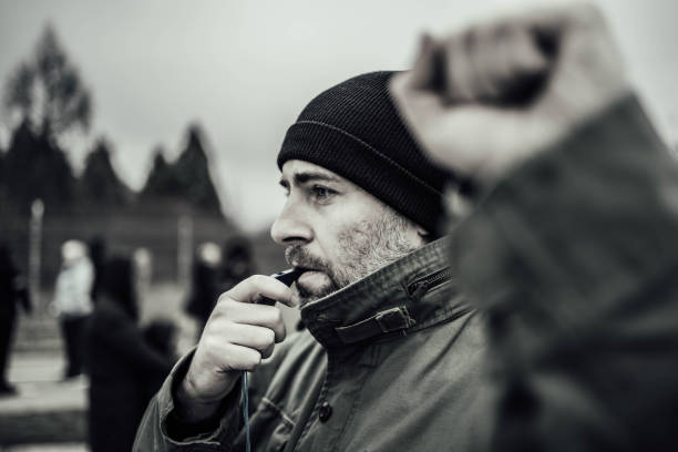 istock Man protests in the street 1298003253
