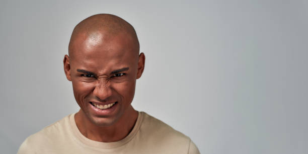 istock Aggressive Afro-American man is feeling pissed off 1298008788