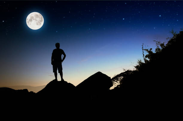 istock adventurer walking to the summit on the mountain 1298013897