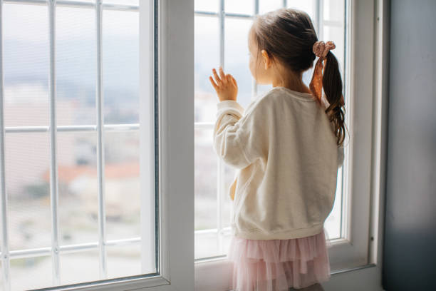 istock Little Girl Self-Isolation At Home 1298015026