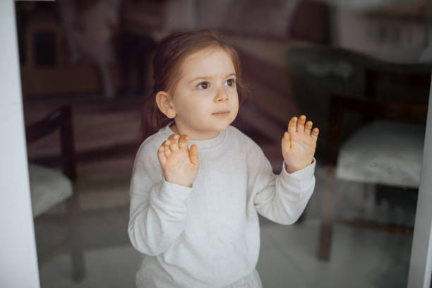 istock Little Girl Self-Isolation At Home 1298015238