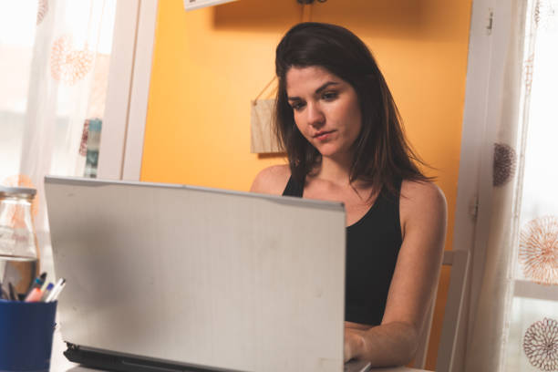 istock Woman working at home 1298016230