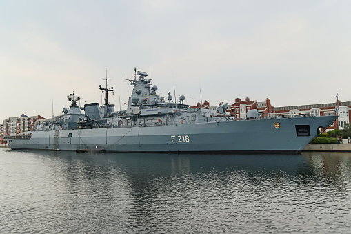 Army ship at dock, background with copy space, full frame horizontal composition