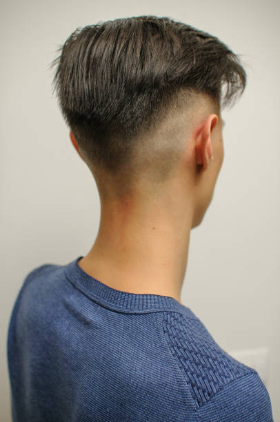 istock Young man with modern short haircut 1298018028