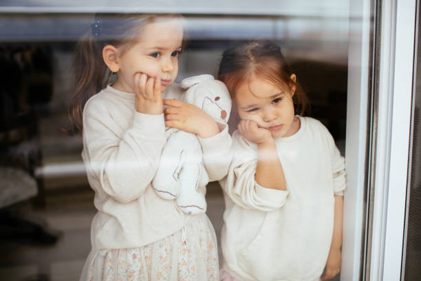istock Little Girls Self-Isolation At Home 1298020512