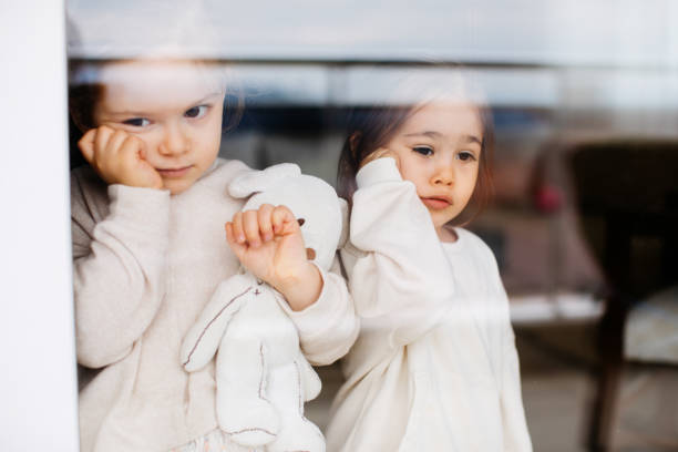 istock Little Girls Self-Isolation At Home 1298020532