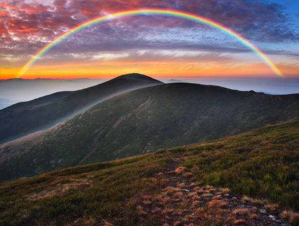 istock Rainbow over the Mountains. autumn morning in the Carpathians 1298022666