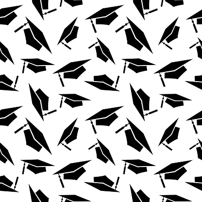 Vector seamless pattern of graduation hats on a white background.