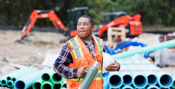 istock African-American man working at construction site 1298023479
