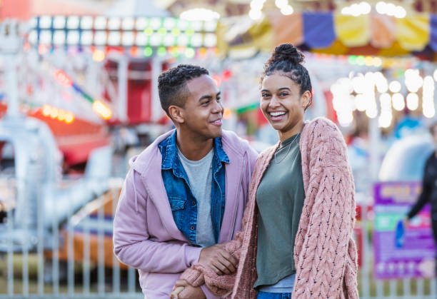 istock Young couple at carnival 1298023544