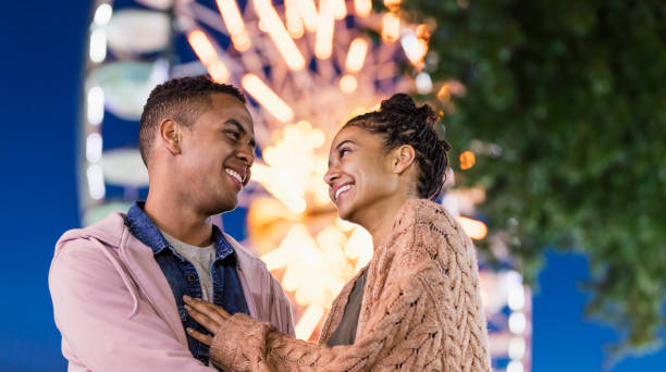 istock Young couple at county fair 1298023577