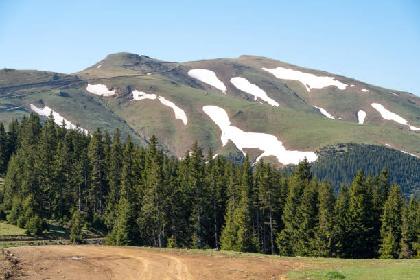 istock magnificent view of the snowy mountains 1298027718