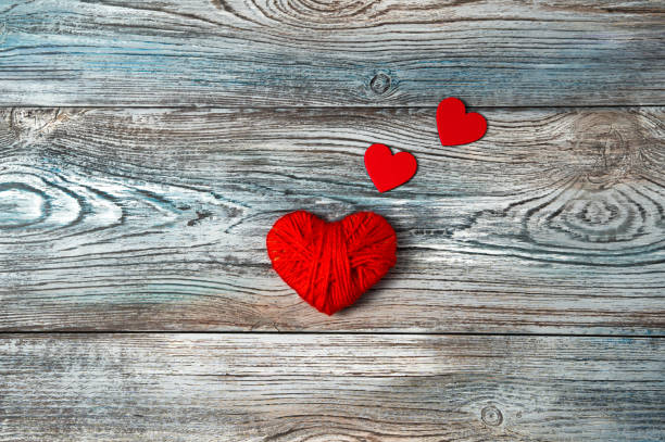 istock Red hearts on a wooden gray-blue background 1298028476