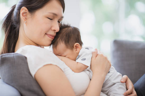 istock Mother and new baby 1298031355
