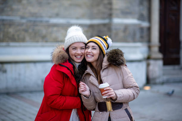 istock Two girls hugging, having wonderful time. 1298035124